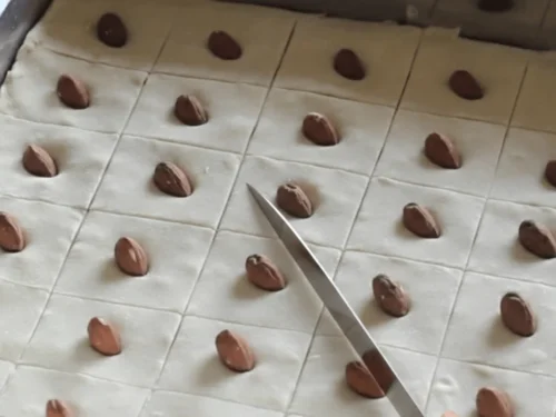 Baklava cut into diamond shapes before baking to allow clean portions and proper syrup absorption.
